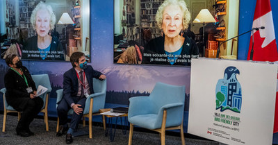 Minister Steven Guilbeault and Mayor of Sainte-Anne-de-Bellevue, Paola Hawa, watching a special message from the renowned author, Margaret Atwood, during the Nature Canada Bird Friendly City event.  Credit: Environment and Climate Change Canada (CNW Group/Environment and Climate Change Canada)