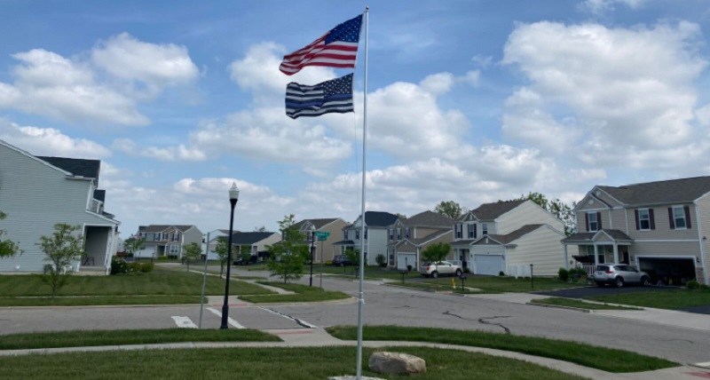 The National Police Association Files Lawsuit Against Home Owner Association for Making Father Remove Thin Blue Line Flag Flown in Honor of His Fallen Officer Son - Vimarsana News