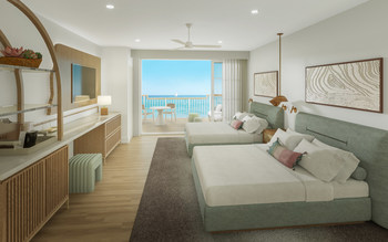 Beaches Negril’s Eventide Penthouse Collection suites offer three to four bedrooms each, some with plush double Queen beds and soft pastels that complement natural woods and views of Negril’s Seven Mile Beach. (PRNewsfoto/Sandals Resorts International)