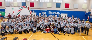 225 Genesco employee volunteers fitted more than 350 students with new shoes at Park Avenue Elementary in Nashville as part of the Company’s Cold Feet, Warm Shoes event. (Photo credit Alan Poizner)