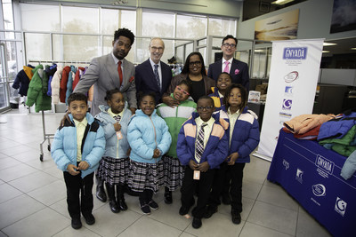 CARS FOR COATS: Over $100,000 has been pledged by local automobile dealers across metro New York to provide warm winter coats for kids. (From l to r) Principal Quinton Dupree of the The Academy Charter School; Mark Schienberg, president of the Greater New York Automobile Dealers Association; Dawn West, Vice Chair of the Board Academy Charter Schools; and Oliver Brodlieb, president of the East Hills Chrysler Jeep Dodge Ram, and children from The Academy Charter School.