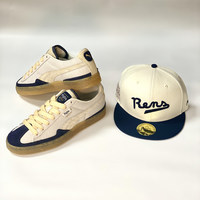 Some of the products dropping in 2023 to celebrate the 100th anniversary of the historic New York Rens basketball team: Footwear by PUMA available in retail stores and at PUMA.com; Physical Culture Supply Co. private label caps available exclusively at Lids stores and Lids.com.