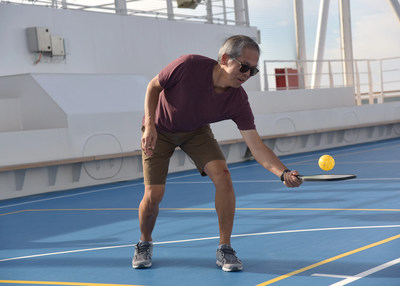 A guest prepares to serve in a game of pickleball on board a Holland America Line ship. . Beginning in February and rolling out fleet-wide by April 2023, complimentary beginner lessons will be offered by shipboard instructors who will teach guests the rules and basics of playing pickleball, including where the “kitchen” is and what it means to hit a “dink” shot.