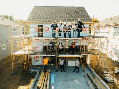 Andersen employees volunteer on a Habitat for Humanity build.