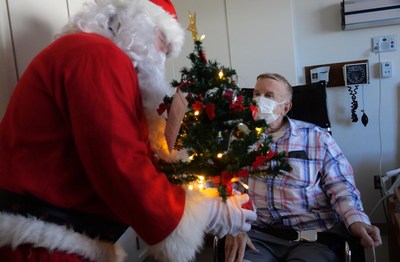 Santa brings a Christmas tree to patients recovering from life-altering illnesses and injuries at Gaylord Specialty Healthcare in Connecticut. After learning about a young patient's determination to purchase 40 trees for others hospitalized during the holiday season, Amazon donated an additional 85 light-up trees to ensure that any Gaylord Hospital patient who wanted a Christmas tree could enjoy one.