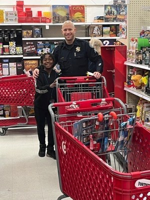 Local officers took children shopping at the Cops & Kids event