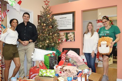 Debt.com happy holiday donation to SOS Children’s Villages Florida
Pictured left to right Christine Burton, Don Silvestri, Jillian Smath, Brenna Hovatter