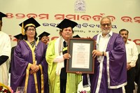 Noted Educationist, social reformer and Founder of KIIT & KISS Dr. Achyuta Samanta being conferred the Honorary D. Litt. by Hon’ble Governor of Odisha and Chancellor of Utkal University Prof. Ganeshi Lal at the University’s Convocation function on Friday. University VC Prof. Sabita Acharya is seen in the picture
