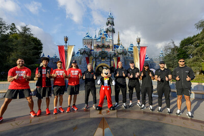 Utah and Penn State made their first stop on their way to the 2023 Rose Bowl Game in Pasadena, Calif., with a traditional visit to the Disneyland Resort in Anaheim, Calif., Dec. 28, 2022. Before meeting on the field, the teams joined for their first official pregame appearance: a photo with Mickey Mouse in Disneyland Park. The teams will face off in the 109th Rose Bowl Game on Monday, January 2, 2023.  (Sean Teegarden/Disneyland Resort)