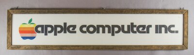 The first trade sign used by Apple Computer Inc. ca. 1976. The sign was first used by founders Steve Jobs and Steve Wozniak at various local trade shows, and then was displayed outside the fledgling company's Cupertino, Ca. offices for several years to identify their premises. To be sold at auction on Jan. 27, 2023 by Alexander Historical Auctions, Chesapeake City, Md.