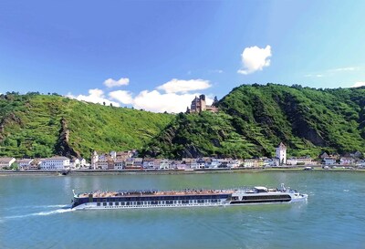 Aboard the Rhine River Cruise: Basel to Amsterdam, travelers journey alongside a National Geographic Expert to four different countries linked by this fabled waterway. This image depicts the AmaMora cruising past the medieval town of Cochem, Germany. (Photo Courtesy of AmaWaterways)