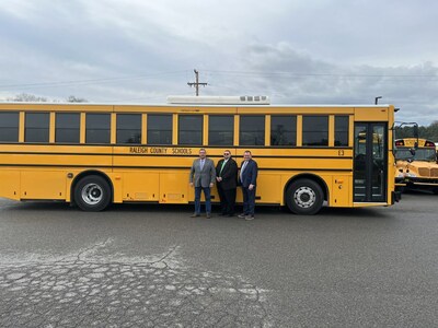 Raleigh County Schools Director of Transportation Gary Daniel takes delivery of a GreenPower all-electric BEAST school bus. Joining him are West Virginia Delegate Chris Toney and GreenPower Vice President Mark Nestlen.