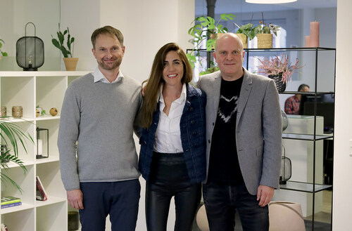 Mads Petersen, Co-founder, standing;  Patricia Pomies, Chief Operating Officer, Globant;  and Sebastian Jespersen, Co-Founder and CEO, Vertic.
