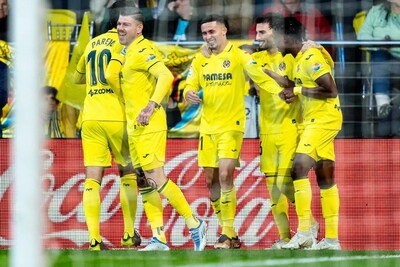 Villarreal players celebrate as they go 1-0 up against Real Madrid.