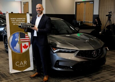Acura National Sales Assistant Vice President Emile Korkor with the 2023 North American Car of the Year award-winning 2023 Acura Integra, in Detroit on January 11, 2023.