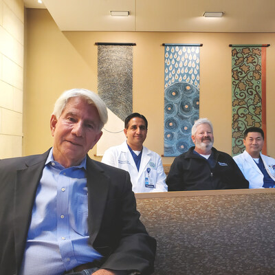 After surviving sudden cardiac arrest, Bob Richardson reunites with Dr. Hassan Pervaiz, Dr. Gary Weinstein and Dr. Brian Le, inside the chapel at Texas Health Presbyterian Hospital Dallas.