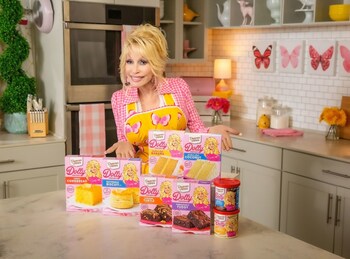 Dolly Parton with her full line-up of Duncan Hines’ baking mixes, cake mixes and frostings. The newest offerings will arrive in stores this January. Duncan Hines is a brand of Conagra Brands, Inc.