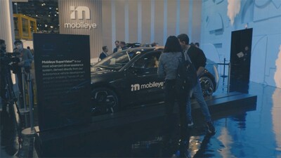 People were drawn to the Mobileye booth, where the ZEEKR 001 is located.