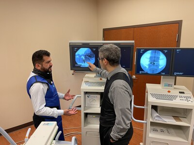 Dr. Abbasi and Dr. Jahwari during OLLIF Training Lab at Inspired Spine Global Headquarters in Burnsville, MN.