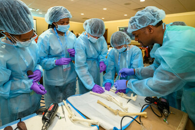 Middle school students learn how to prepare for surgery and use veterinary surgical tools at special student program at VMX 2023