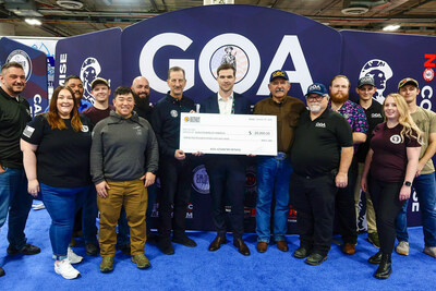 Henry Repeating Arms Vice President of Communications Dan Clayton-Luce presenting a $25,000 check to Gun Owners of America’s leadership, board members, staff, and volunteers at the 2023 SHOT Show.