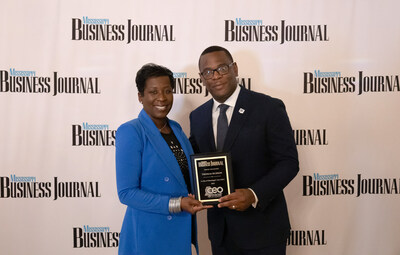 Mississippi Business Journal Publisher Tami Jones presents Jackson State University President Thomas K. Hudson, J.D., with the 2023 Top CEO award. (Photo: Jackson State University / Spencer McClenty)