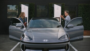 It’s Time to Go Electric | Screen grab of Hyundai’s TV ad featuring Sosie Bacon (left) and Kevin Bacon (right) charging the IONIQ 6.