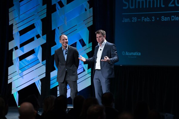 Roskill and Michaud on stage at Acumatica Summit (CNW Group/Velixo)
