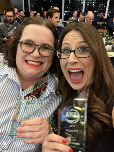 Ansira's Colleen Harris (Principal Product Manager, BI & Reporting) and Erin Zaborac (Director of Sales Enablement) celebrate Ansira's 2023 AWA Awards in the Digital Marketing category and the Website Platform categories.