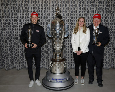 Marcus Ericsson, Michelle Collins and Chip Ganassi with the Borg-Warner Trophy at the Baby Borg ceremony in Palm Springs, California February 2, 2023