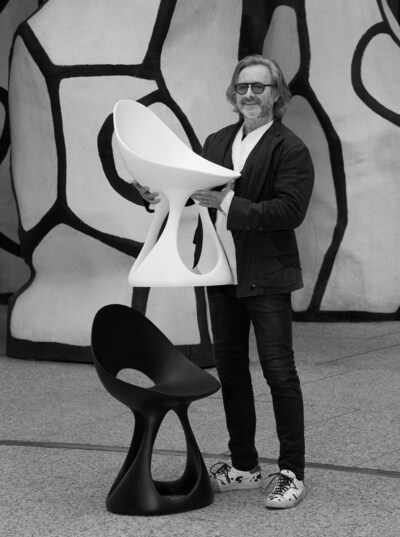 Internationally acclaimed designer Paul Mathieu and his LIBRE Chairs. Photo credit: Laurent Badessi