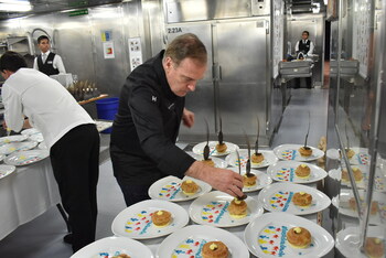 Jacques Torres prepares gourmet foods aboard the Holland America fleet.