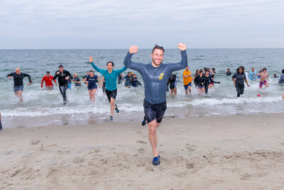 Synchrony employees take polar plunge for charity. Pictured is Synchrony employee Jeff Silverman, based in Stamford (centered).