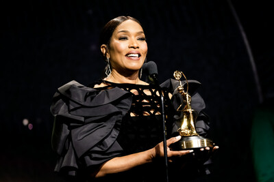 Angela Bassett is honored with the Distinguished Artisan Awards at the 10th Anniversary MUAHS Awards.