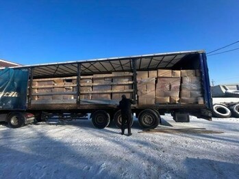 Transporting Aid Relief Materials on Designated Trucks to Ukrainian Crisis Hit Regions