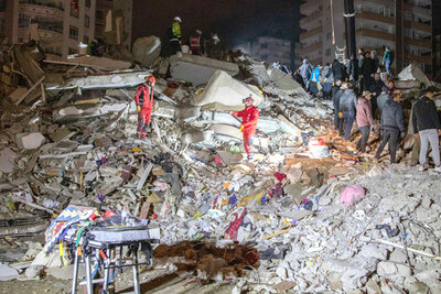 Rescuers continue to search for and pull people from collapsed buildings throughout the night from the earthquake in Adana, Turkey on February 6, 2023.