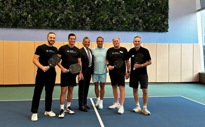 Life Time Founder, CEO and Chairman Bahram Akradi and The Moinian Group Founder and CEO Joe Moinian, are joined by pickleball pros and coaches to celebrate the opening of pickleball courts at Life Time Sky.