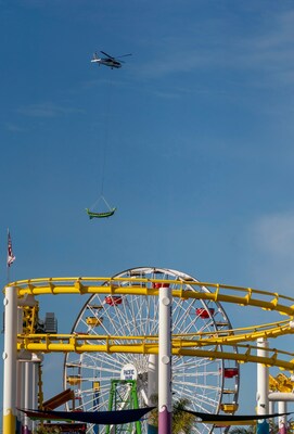 After delighting guests with more than 12 million rides in 26 years at Pacific Park on the Santa Monica Pier in Santa Monica, Calif., the 6,000 pound, 26 feet long, bright green Sea Dragon took its last ride into retirement on Thursday, March 9, 2023, with an epic heavy-duty helicopter flight by HP Helicopters across the Santa Monica Bay and landing at the Port of Hueneme in Ventura County, for transport to its retirement destination at City Museum in St. Louis, Mo.