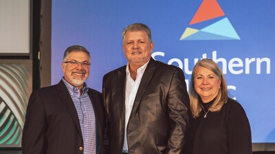 Rich Wiltfang has been named Southern Linc's 2022 Dealer of the Year.  Wiltfang (center) is pictured with Southern Linc CEO Carmine Reppucci (left) and former CEO Tami Barron (right) at the company's recent sales summit.