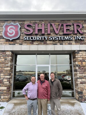 Eric Garner, President of Pye-Barker's alarm division, meets with Chip Shiver and Wayne Lisle of newly acquired Shiver Security Systems.