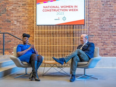 Dr. Stephanie Akunvabey, VP for equity and inclusion and Chief Diversity Officer at Roger Williams University, and Shawmut CEO Les Hiscoe during the WIC Week opening ceremony.