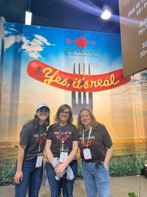 Applegate team members showcasing the Applegate Naturals® Do Good Dog™, the first retail hot dog made with regenerative agriculture.