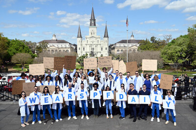 International dermatologists, Dude With Sign, and Dudette With Sign seen in the French Quarter in New Orleans, Thursday, March 16, 2023, to raise awareness of wearing SPF daily with CeraVe. (Photo by Cheryl Gerber/Invision for CeraVe/AP Images)
