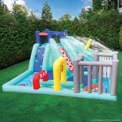 The classic board game is now an incredible life-size inflatable with a water slide, obstacles, and even a jail! Introducing MONOPOLY SPLASH new from WowWee