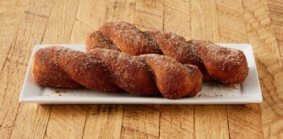Korean Donuts, or Kkwabaegi (kwa-bag-gee), are soft, fluffy, twisted donuts coated with cinnamon and sugar.