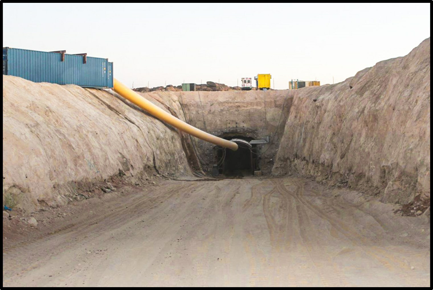 Global Atomic - Dasa Mine portal with temporary ventilation tubing installed for ramp development (CNW Group/Global Atomic Corporation) Global Atomic - Dasa Mine portal with temporary ventilation tubing installed for ramp development (CNW Group/Global Atomic Corporation)