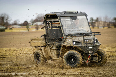 Landmaster AMP driving through mud.