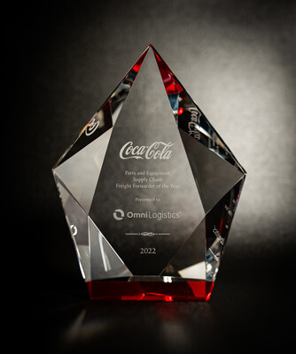 Omni Logistics' Coca-Cola Freight Forwarder of the Year trophy.