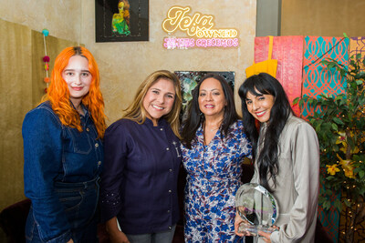 PepsiCo Juntos Crecemos and Chef Lorena Garcia, alongside Latina entrepreneur Patty Delgado, present a Jefa-Owned trophy to Lucy Haro, owner of Qusqo Bistro and Gallery to celebrate her success.