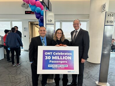 Photo Caption: From left: Atif Elkadi, CEO, Ontario International Airport Authority (OIAA); 30 millionth passenger Jessica Burchett; Alan D. Wapner, president, OIAA